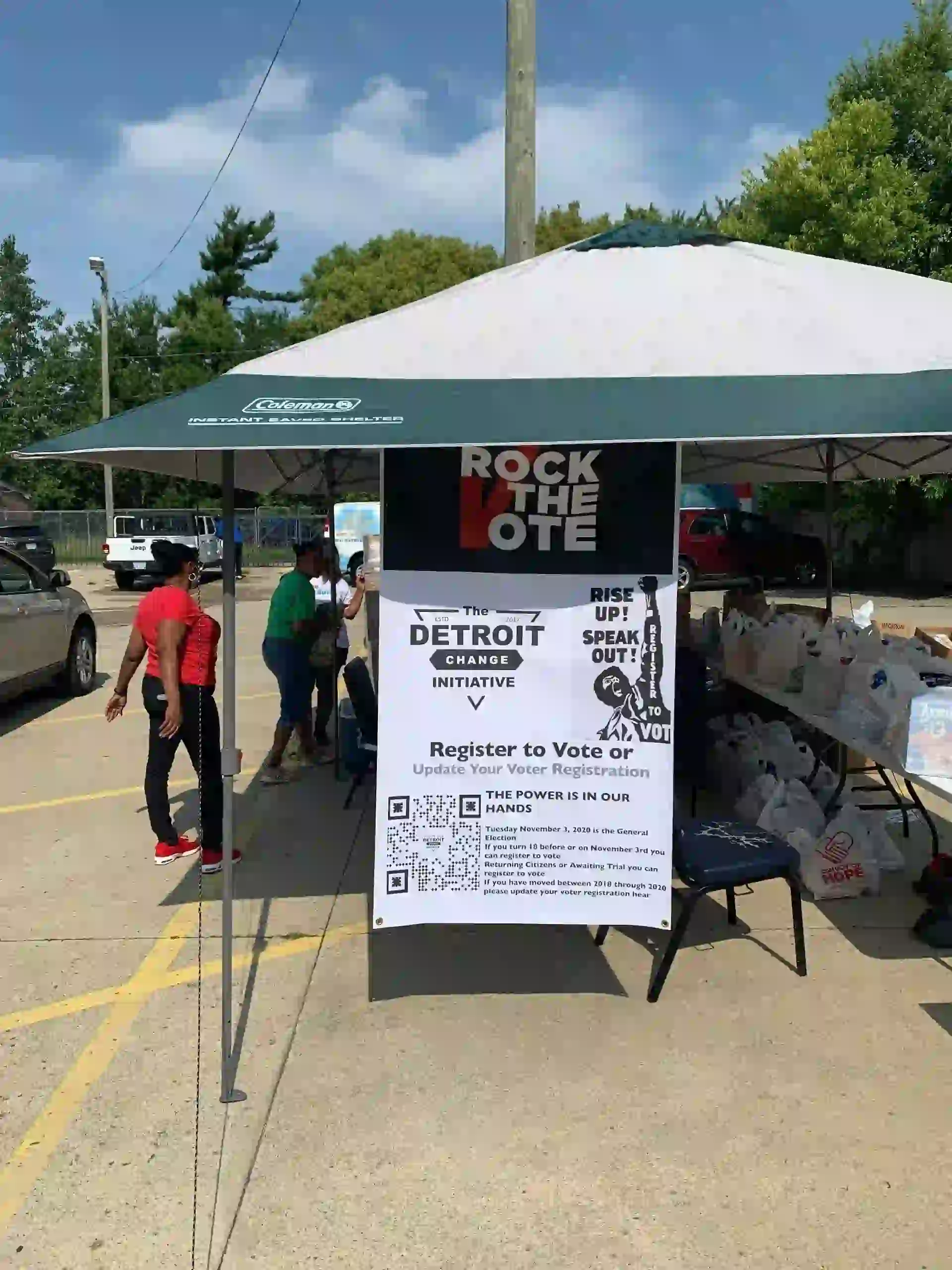 Detroit voter registration booth under canopy